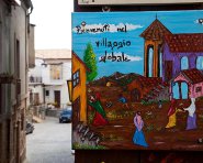 Riace murales villaggio globale